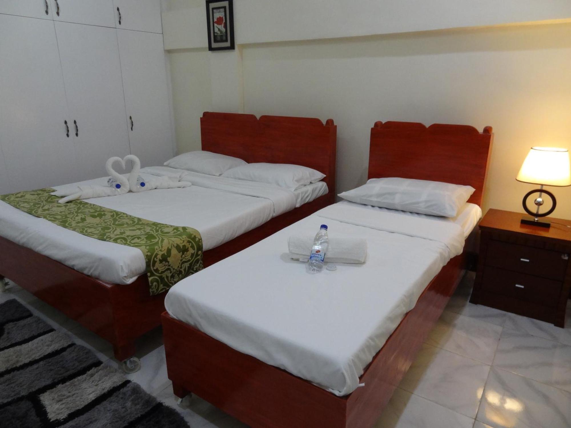 The Executive Villa Inn & Suites Davao City Szoba fotó